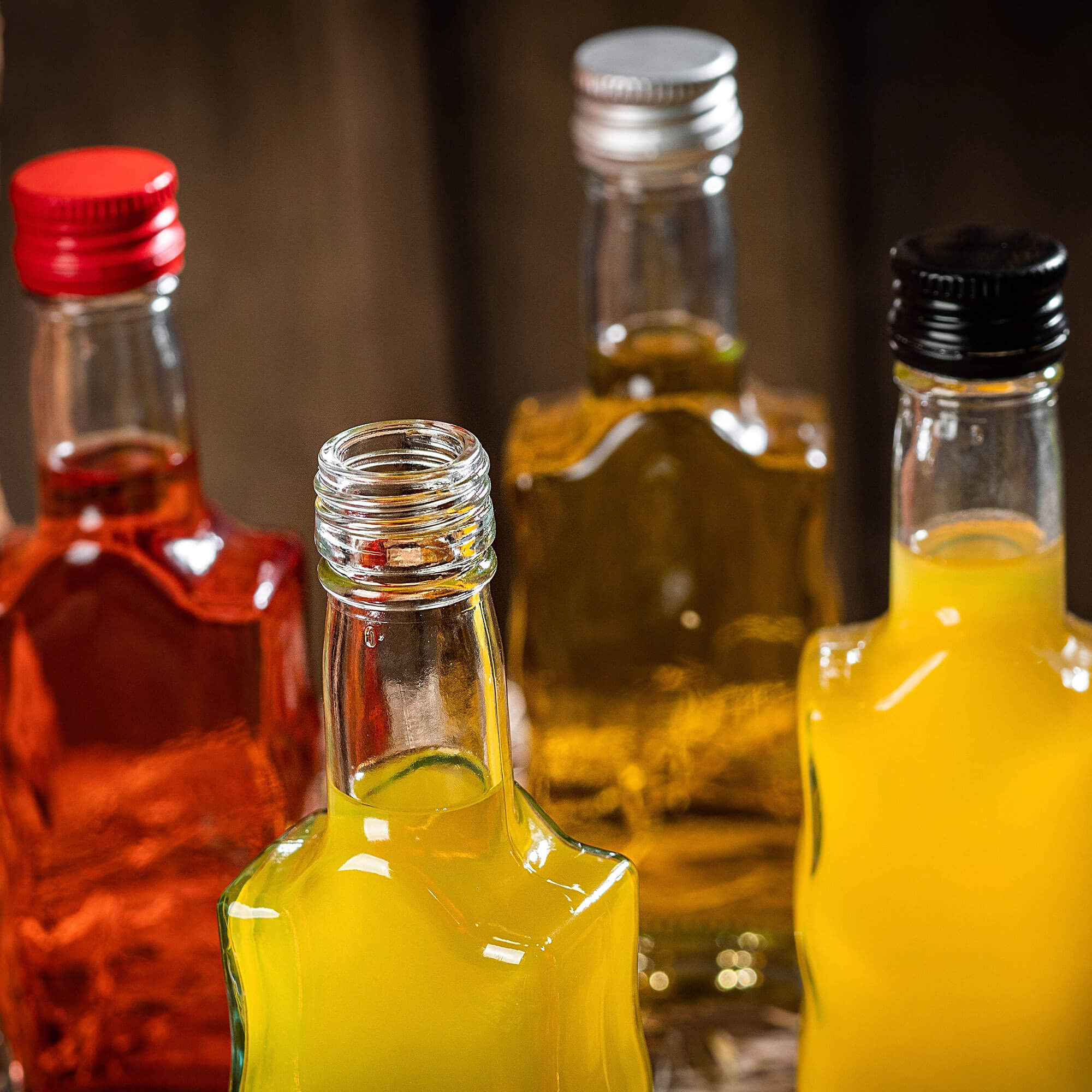 Szklana butelka na nalewkę Fala 200ml z czerwoną zakrętką 50 szt.